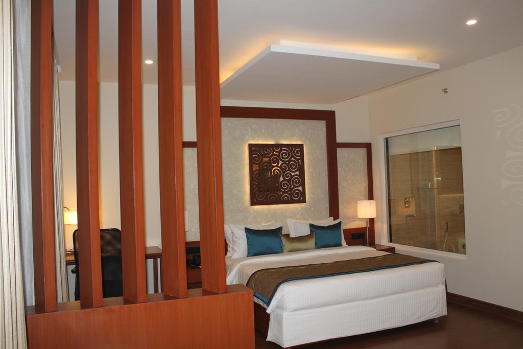 The Altruist Business Hotel Hitech Хайдарабад Номер фото